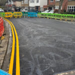 Large Tarmac Patch in Road For Local Council and Lining