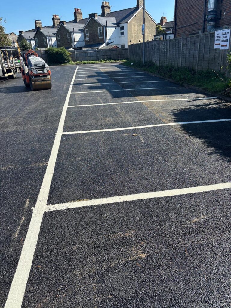 Freshly Finished Tarmac Car Park With Bay Lining