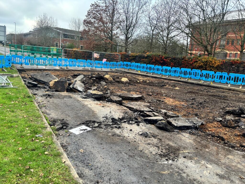 Breaking out road prepping for repair